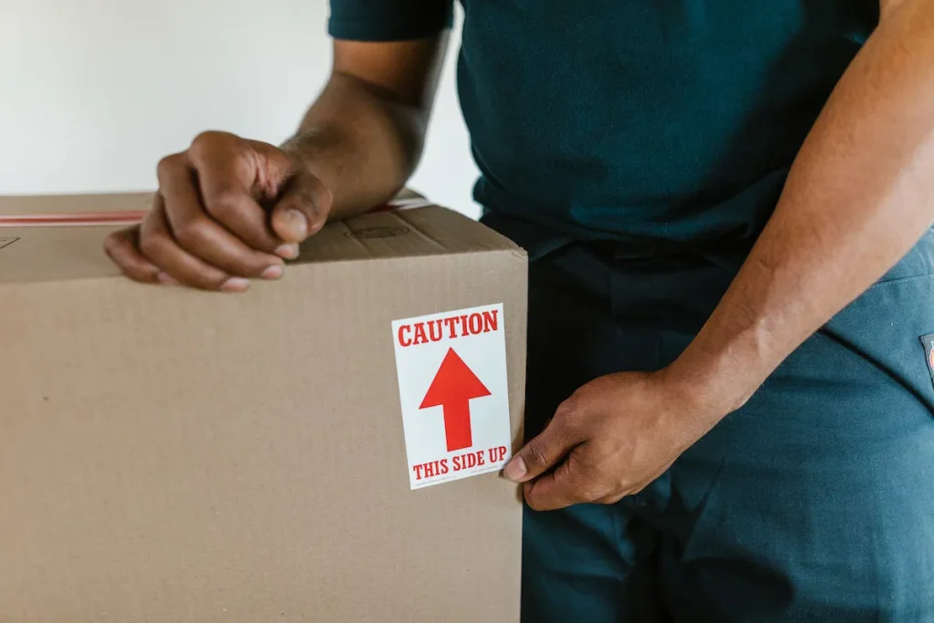 box with caution | Moving services
